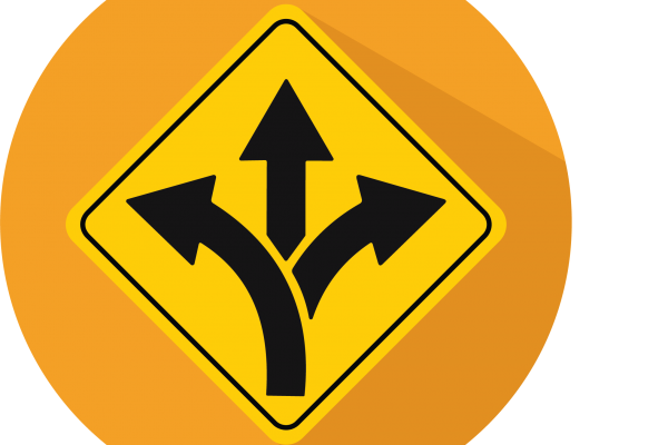 orange circle with directional road sign